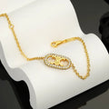Celine Gold Finish Crystal Bracelet - Iconic Design