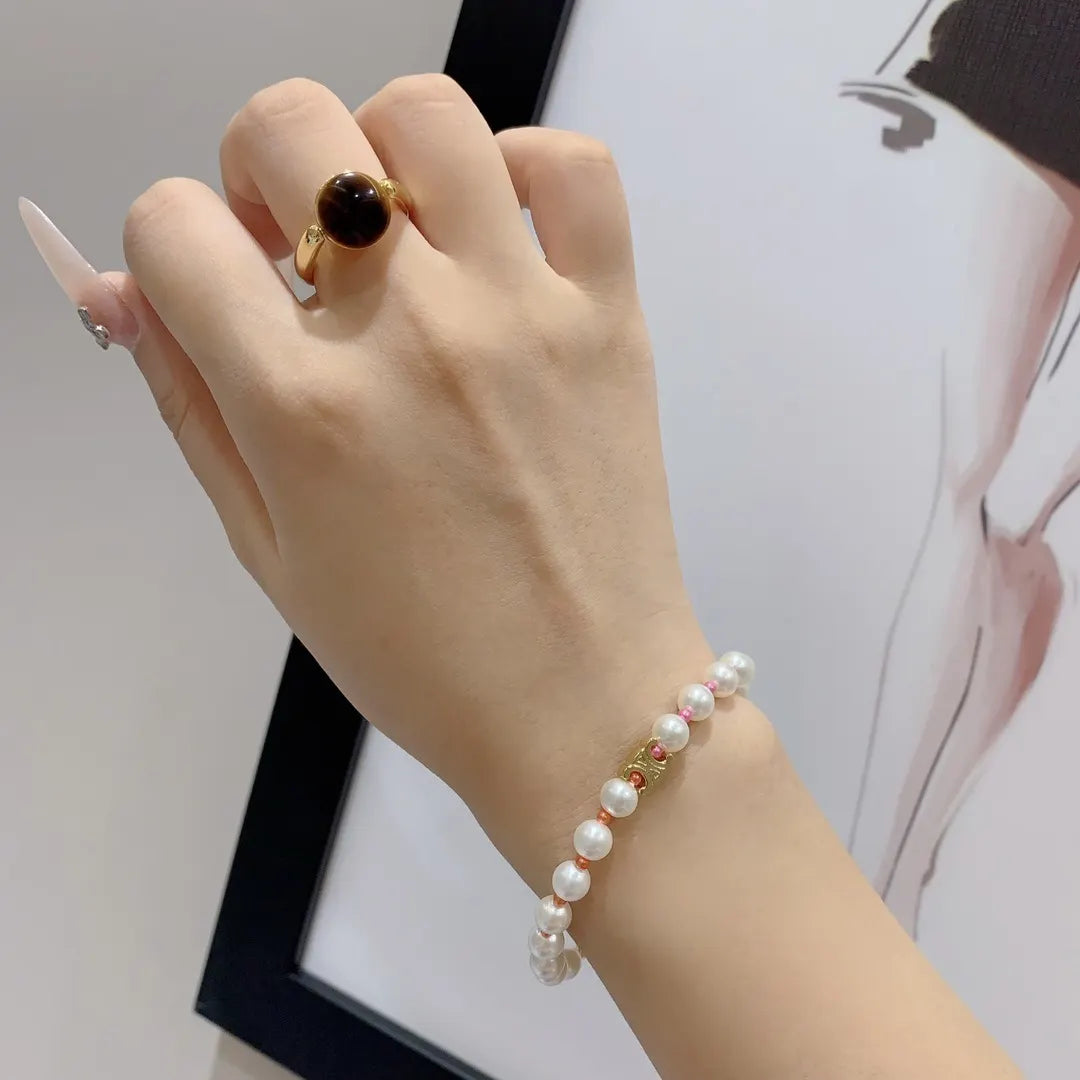 Elegant Pearl Bracelet with Gold Accents