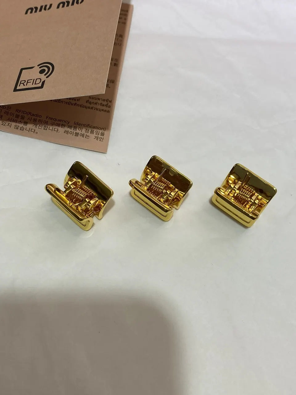 Miu Miu Gold-Tone Logo Hair Clips - Designer Chic