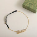 Gucci Gold Script Logo Necklace detail - Gucci Gold Script Logo