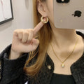 designer jewelry Bottega Veneta Gold Crystal Hoop Earrings - Bottega 2