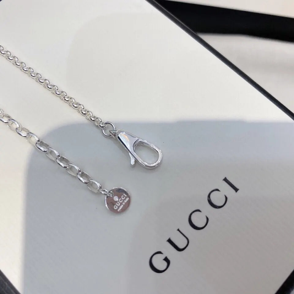 Gucci Silver Cylinder GG Logo Necklace - Iconic Design