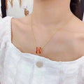 Hermès Red Enamel H Pendant Necklace - Gold-Tone