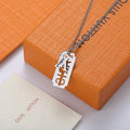 Louis Vuitton Silver Razor Pendant Necklace - Edgy Style