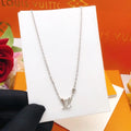 Louis Vuitton Silver Monogram LV Necklace - Chic Pendant