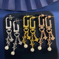 Louis Vuitton Dangle Pearl Earrings - Gold Finish