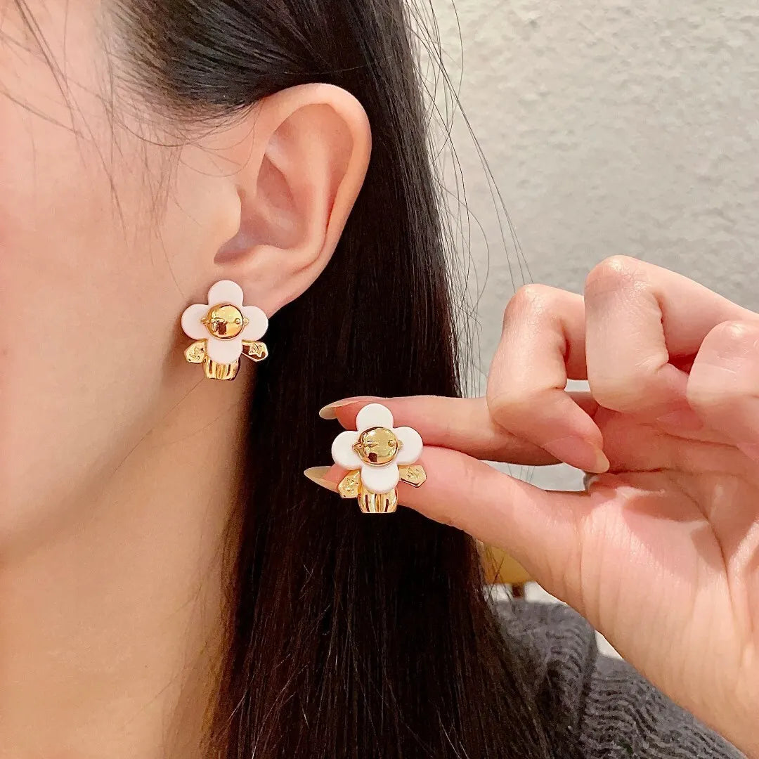 Louis Vuitton White Flower Stud Earrings - Gold Tone
