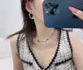 Chanel Gold Oval Hoop Earrings - CC Logo Designer Jewelry