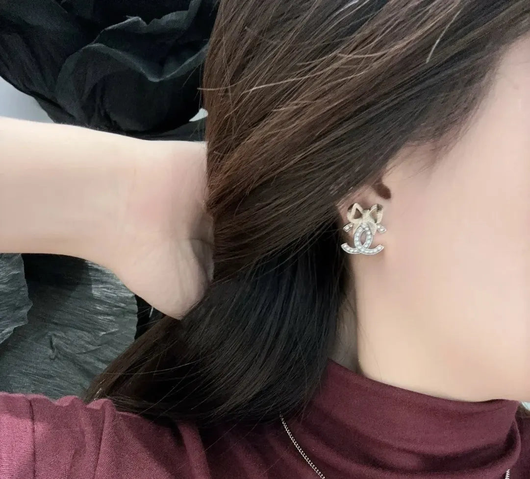 Chanel Gold CC Bow Earrings - Designer Accessory