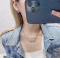 dazzling Chanel Silver Crystal CC Logo Necklace - Chanel Silver