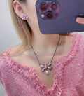 Chanel Pink Bow Pearl Necklace - Designer Charm