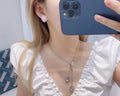 Chanel Heart Pearl Earrings - Designer Studs