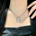 Chanel White CC Logo Pendant Necklace - Silver Finish