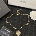 Chanel Gold Heart Pearl Necklace - Black & White Beads