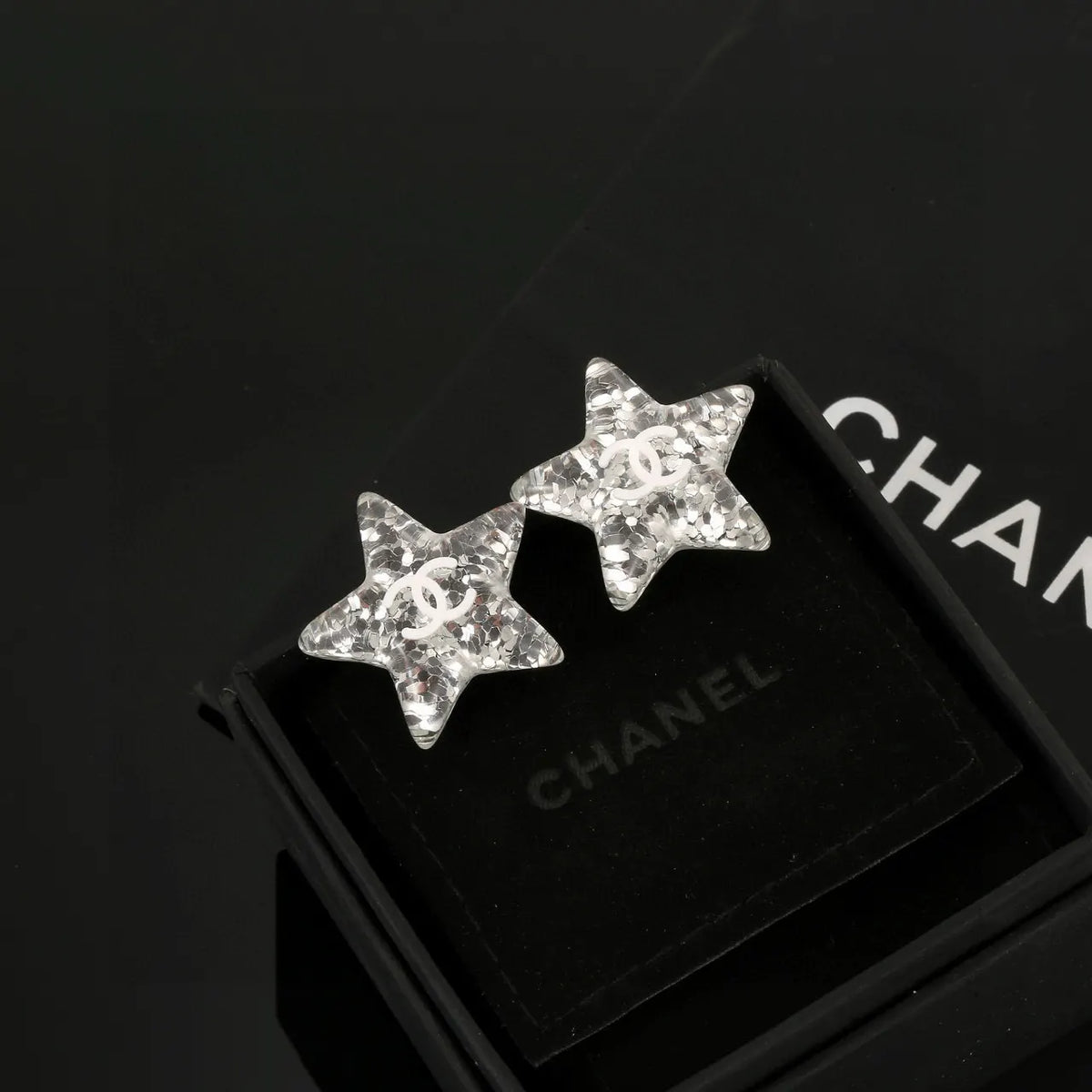 Chanel Silver Glitter Star Earrings - Designer Jewelry