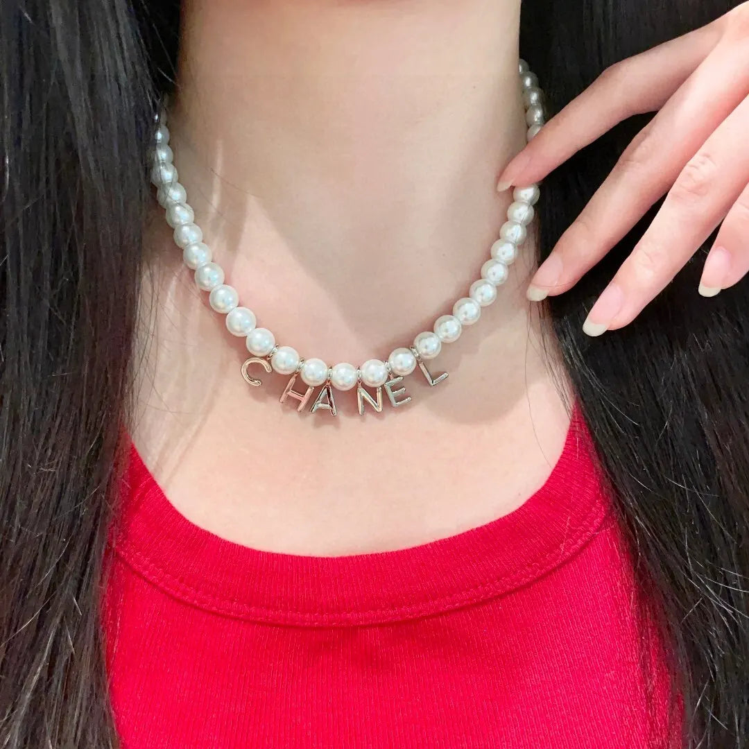 Chanel Pearl Letter Necklace - Silver Hardware
