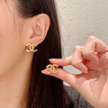 Chanel Gold CC Stud Earrings - Chanel Gold Intertwined CC Stud