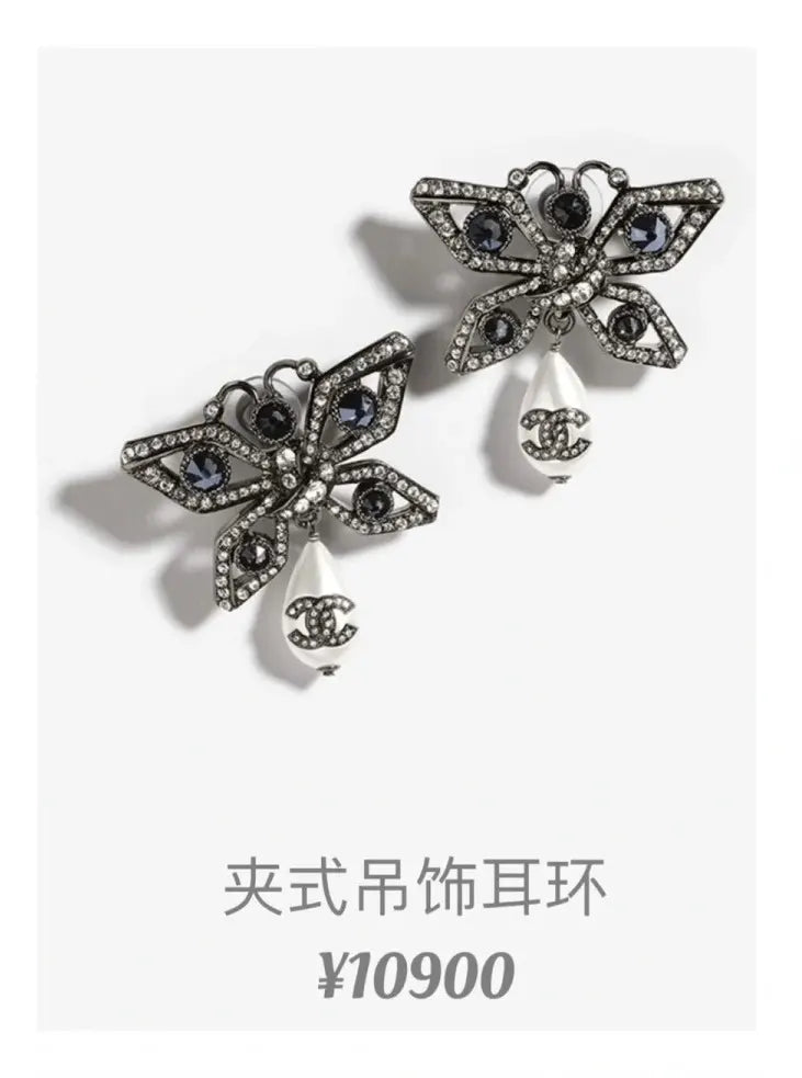Chanel Silver Butterfly Pearl Earrings - Designer Chic
