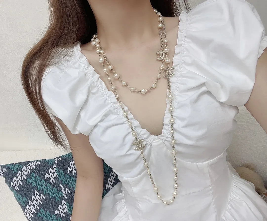 Classic Chanel Long Pearl Necklace CC Logo - Timeless Elegance