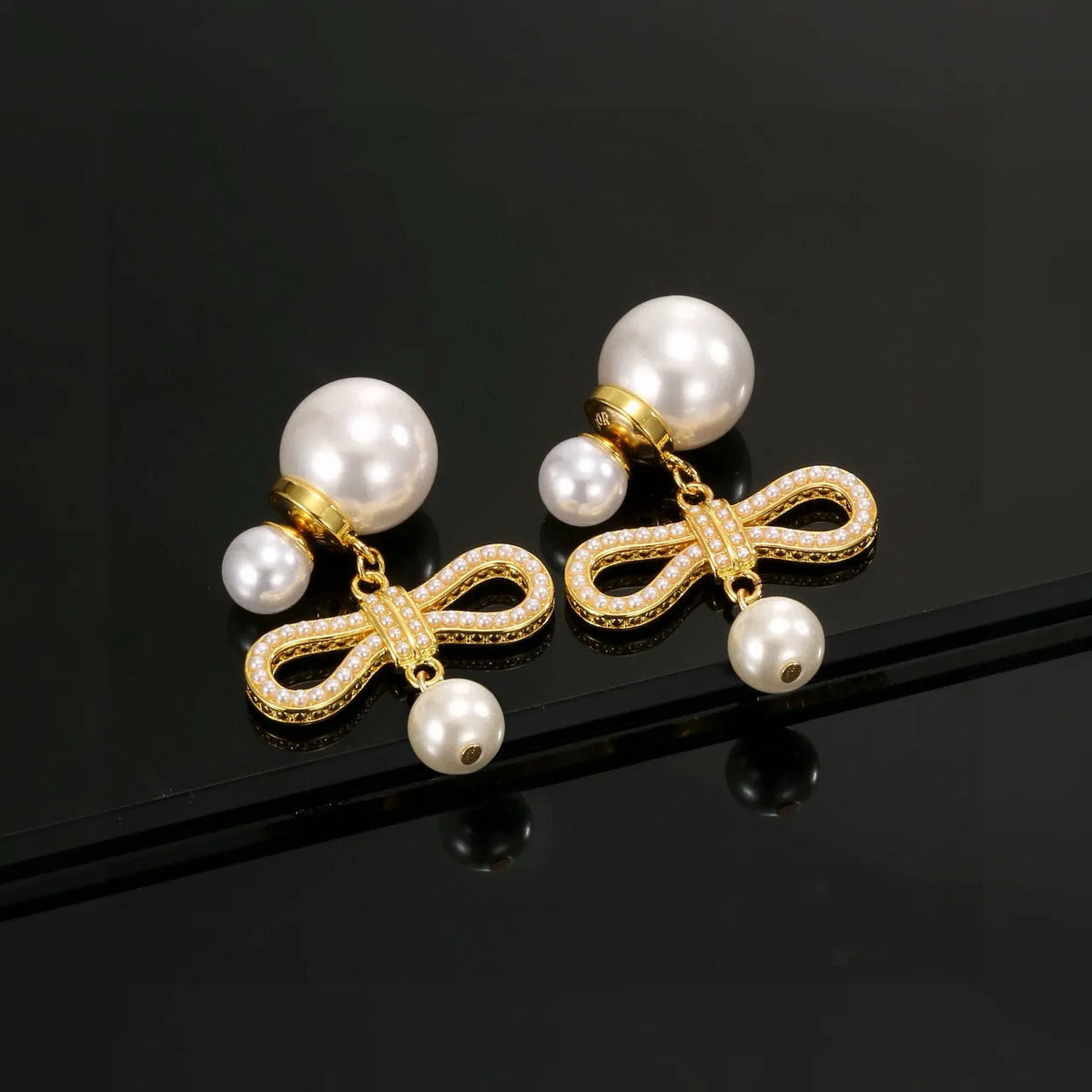 Dior Gold Bow Pearl Earrings - Statement Drop Style