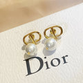 Dior Gold & Pearl Drop Earrings - Elegant CD Design