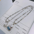 Dior Silver Finish Necklace - Robot Charm, Blue Accents