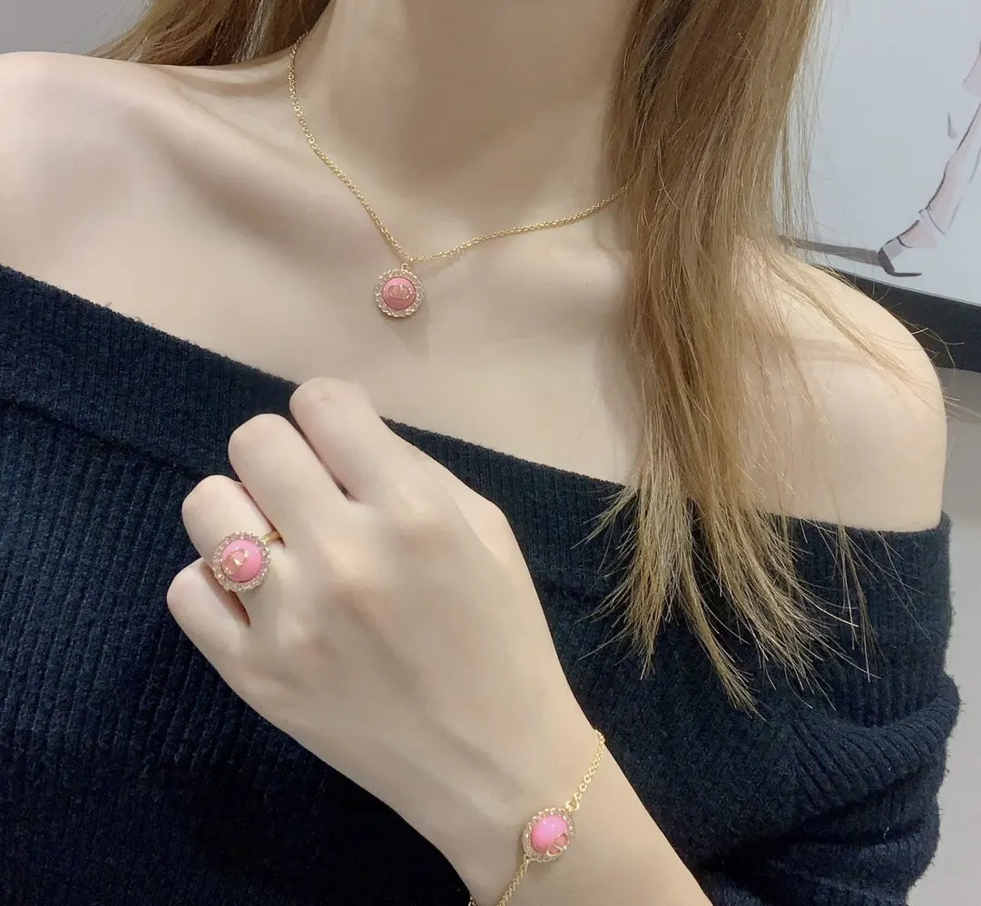 Dior Pink Stone Gold Ring - Elegant Designer Jewelry
