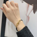 Dior Gold-Tone Black Cord Bracelet - Iconic CD Clasp
